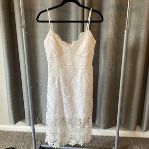 White lacy dress wedding engagement photos rehearsal dinner